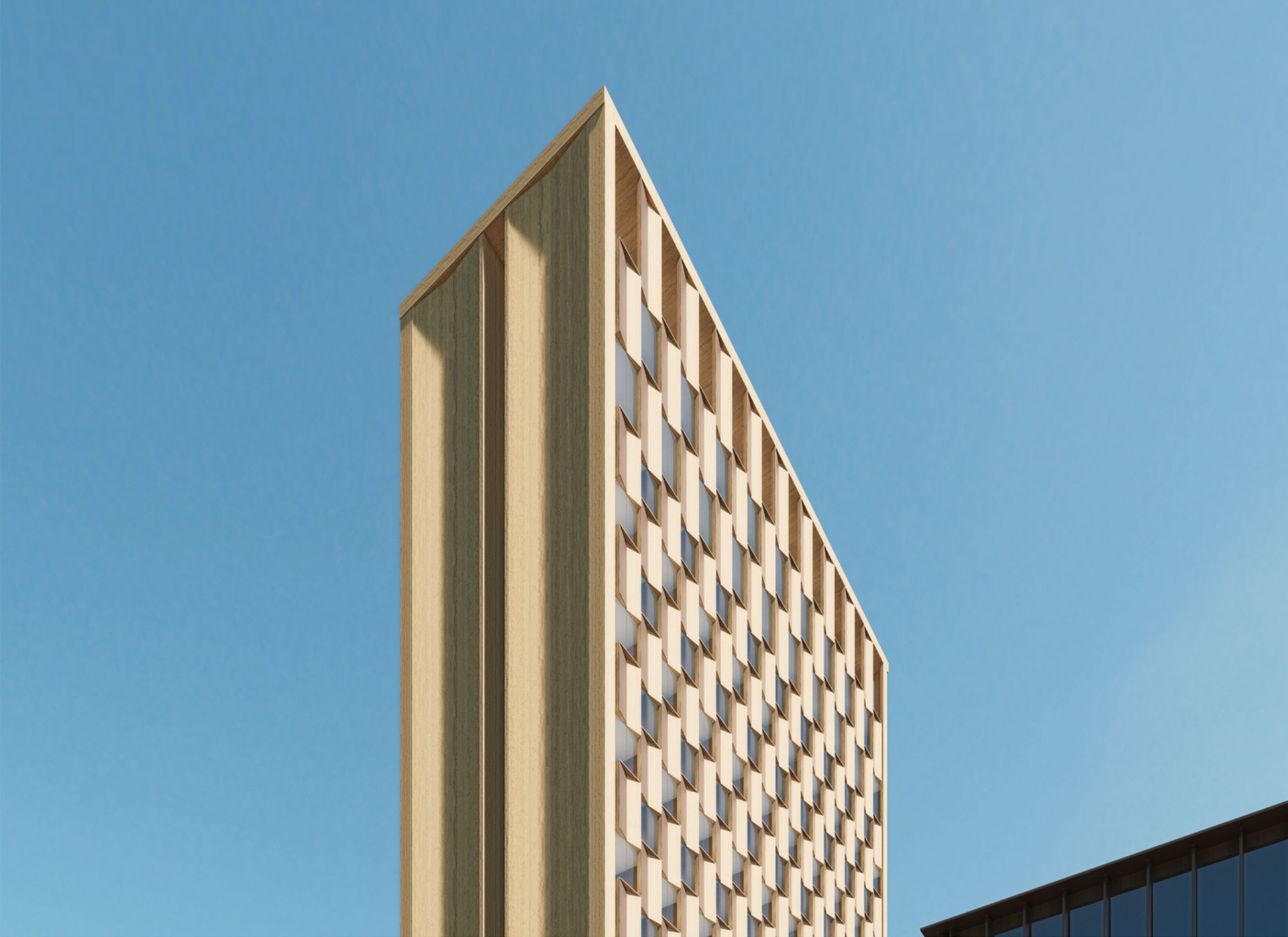 Tower facade rising against a clear blue sky, with vertical timber-toned fins