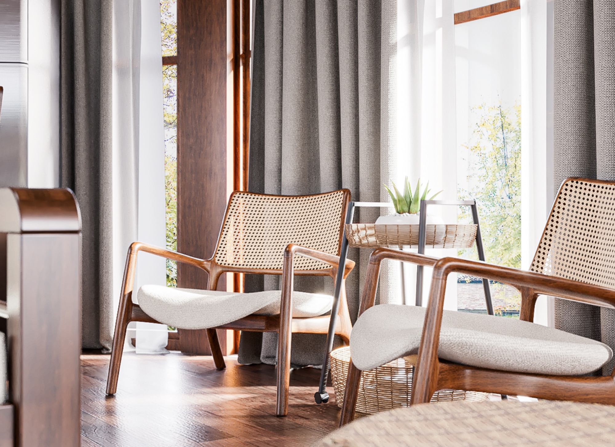 Two cane lounge chairs by tall curtained windows